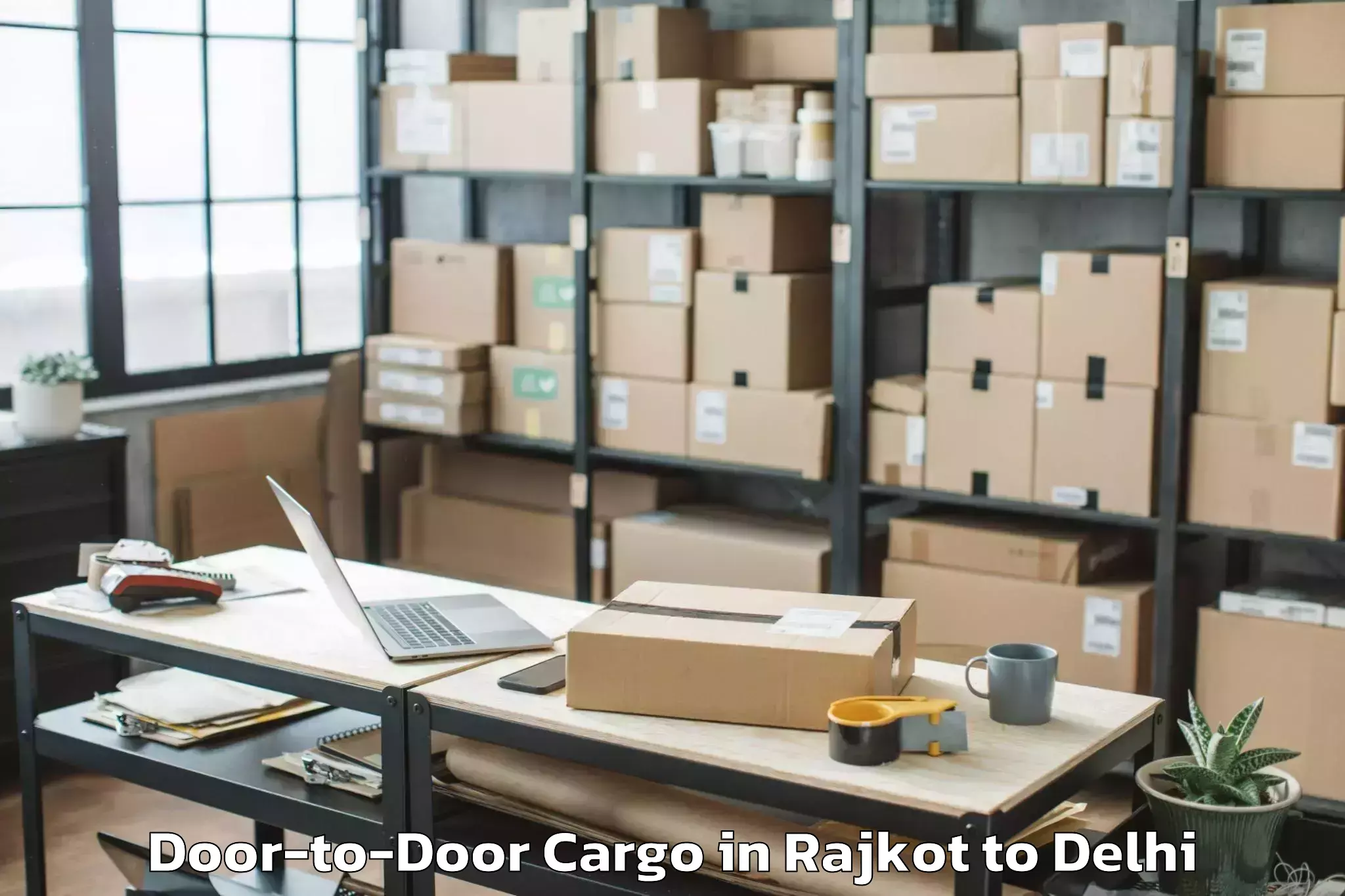 Rajkot to Dlf Promenade Mall Door To Door Cargo